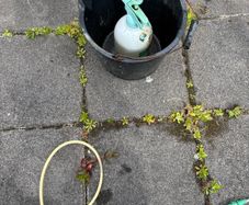 Black plastic bucket