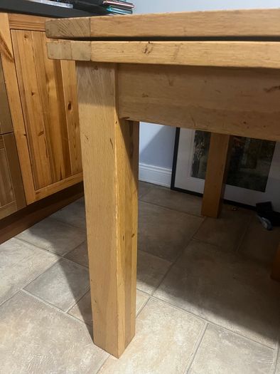 Solid Oak extending dining table and chairs