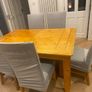 Large Extendable Solid Wood Dining Table & 8 Chairs (Covers Included) Image 3