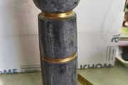 Marble column gold and dark gray candle holder.