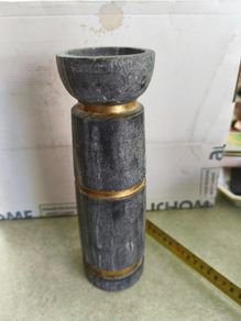 Marble column gold and dark gray candle holder.
