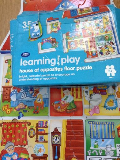 Large jigsaw of house, teaching opposites and vocabulary
