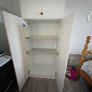 White wooden wardrobe with shelves Image 5