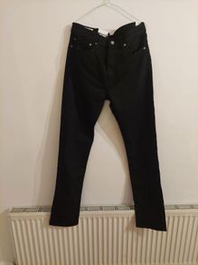 Mens Levis 502" Taper Jeans in black.