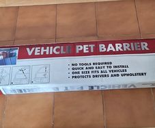 Vehicle pet barrier