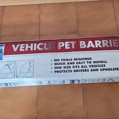 Vehicle pet barrier