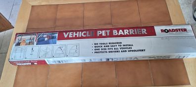 Vehicle pet barrier