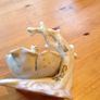 Beautiful porcelain baby in a flower Image 3