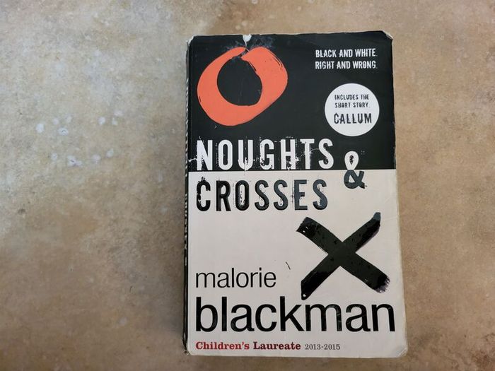 Noughts & Crosses by Malorie Blackman.