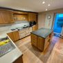 Solid wood kitchen with granite island Image 3