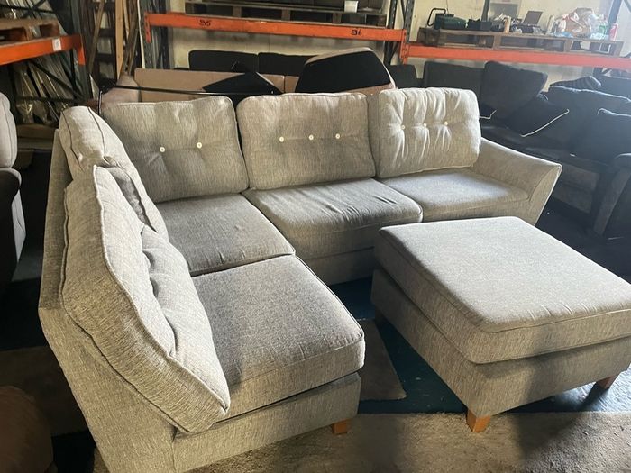 Grey corner sofa with matching footstool