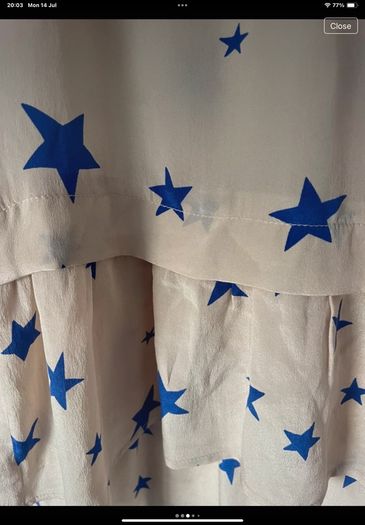 top bnwt 100% silk peplum top Pyrus brand cream with blue star pattern small