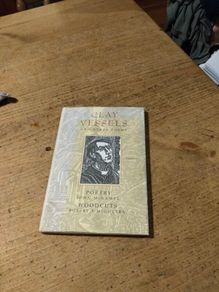 Clay Vessels & Other Poems, written by John McNamee with woodcut illustrations by artist Robert F. McGovern.