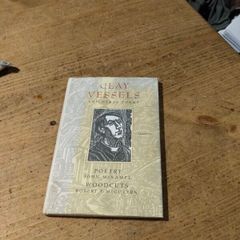 Clay Vessels & Other Poems, written by John McNamee with woodcut illustrations by artist Robert F. McGovern.