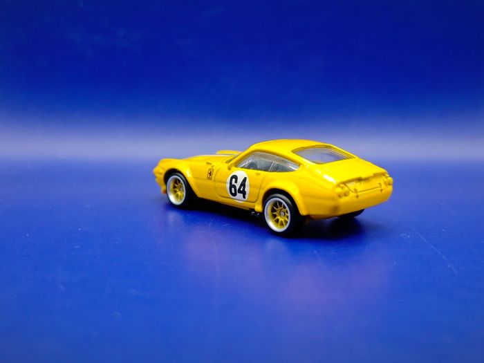 Hot Wheels Ferrari 365 GTB4 C with custom wheels.