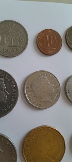 Coins a mix of different countries 28 coins in total registered post included