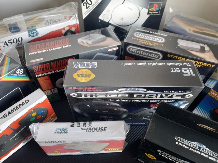 Collection of Retro Mini Games Consoles & Controllers & a PS4 (All Brand New Unopened)