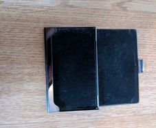 Metal and black velvet business card holder