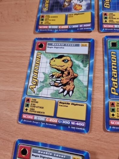 12 Rookie level Digimon cards. 1999