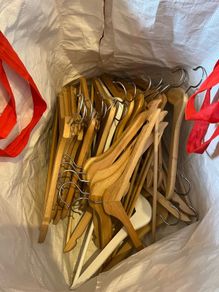 Big bag of wooden hangers