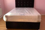 Double and small Double beds in black color
