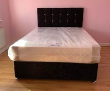 Double and small Double beds in black color