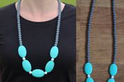 Grey, turquoise and white teething necklace for babies and parents.