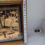 Lovely gold picture of bridge and boy in boat. Image 2