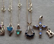 Vintage 9 CT gold necklaces, pendans.  Price from 65 euro