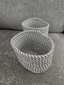 Two storage baskets