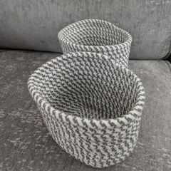 Two storage baskets