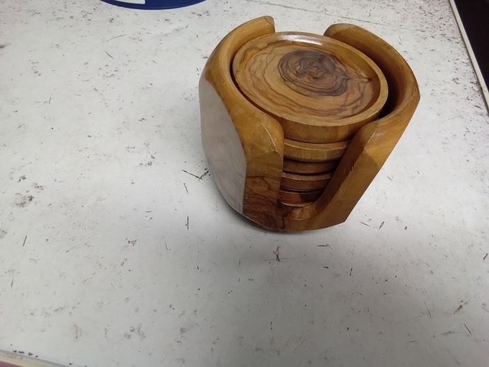 set of olive wood coasters