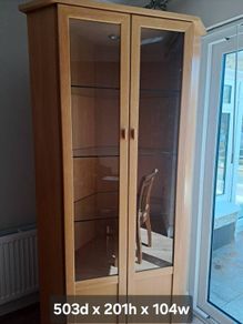 Rossmore corner glass display cabinet, sideboard and music system unit.