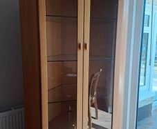 Rossmore corner glass display cabinet, sideboard and music system unit.