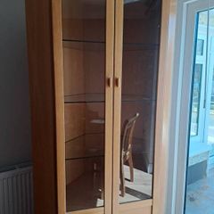 Rossmore corner glass display cabinet, sideboard and music system unit.