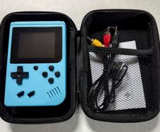 3 Video Game Consoles With Cases (new).