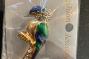 Small green parrot brooch (new, multiple)