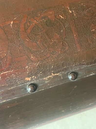 Rare antique low shoe changing bench. With celtic design embossed in the  leather