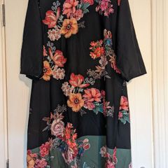 Perfect for Summer. Gorgeous long sleeve floral midi dress from Marisa & Marie