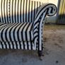 Vintage pair of camelback sofas Image 2