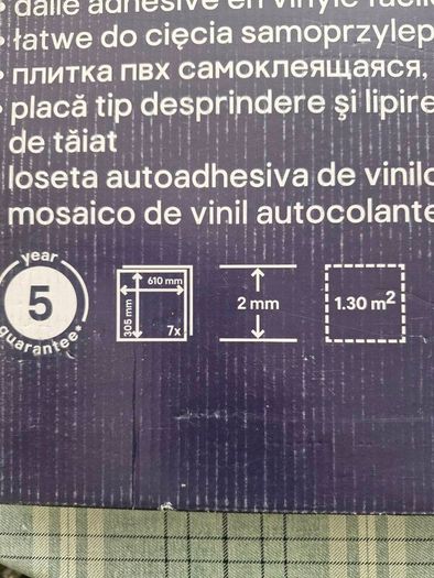 Self-adhesive floor tiles