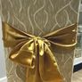 Gold satin chair sashes / bows Image 2