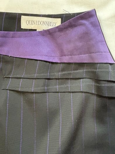 Quin and Donnelly Black with purple pin stripe and panel skirt