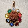 Rudraksha seed pendant with natural precious stones ruby emerald sapphire Image 7