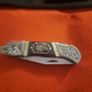 Lock knife with bear head bone handle Image 4