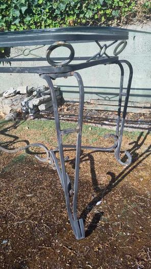 Garden table with glass top