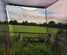 Golf hitting net with metal surround