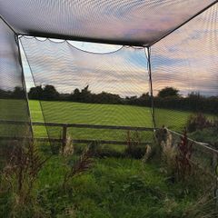Golf hitting net with metal surround