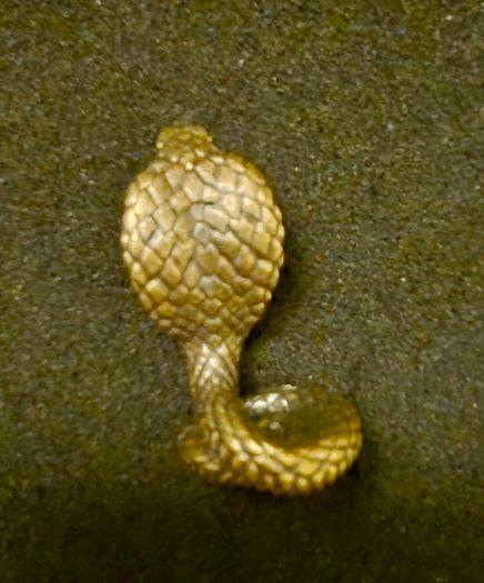 3 brass snakes.